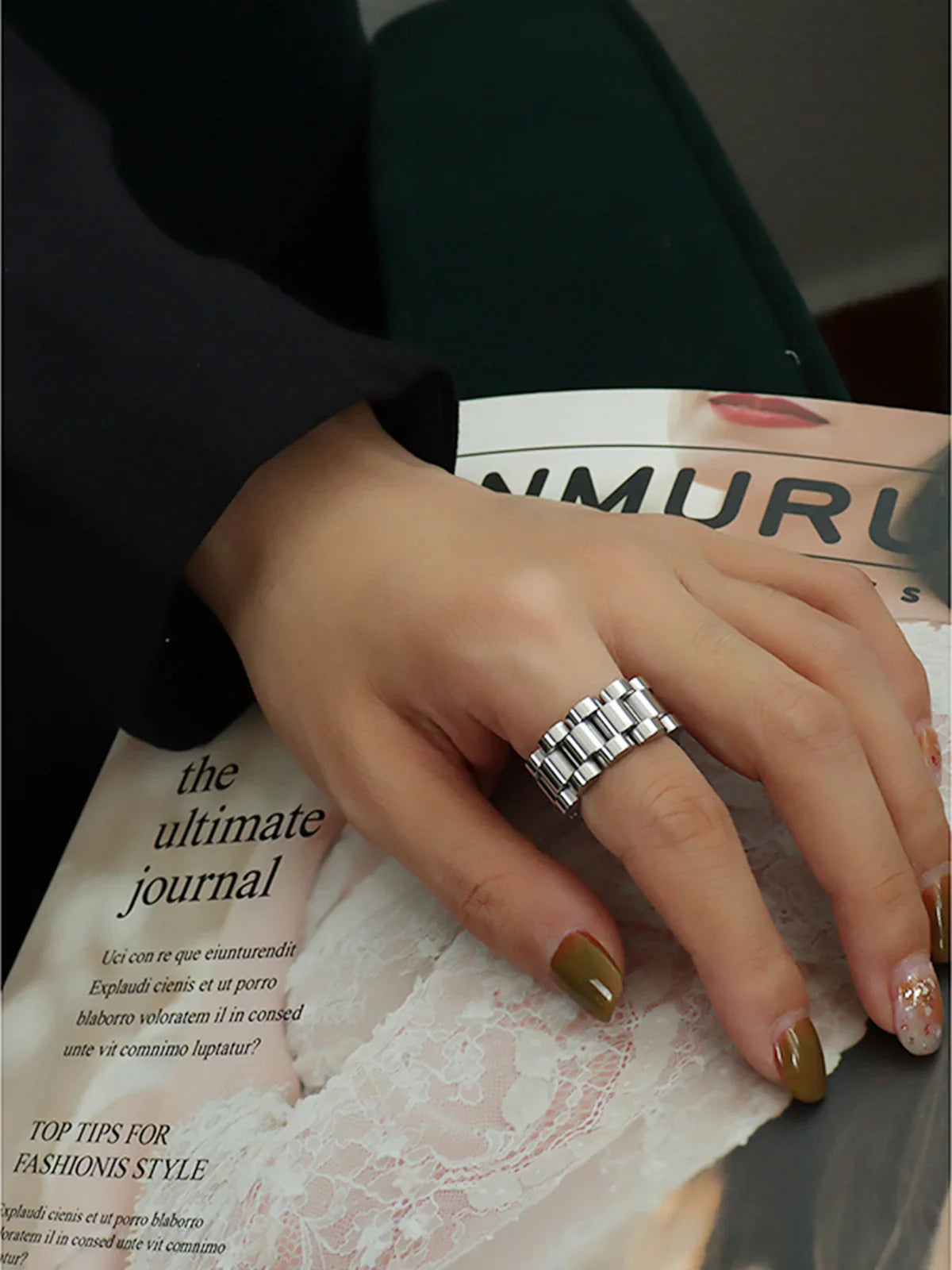 Lisha Secret Holds Ring